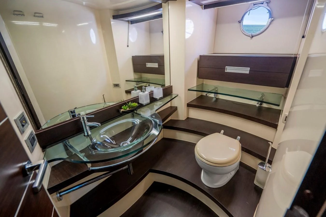 a bathroom with a sink and a toilet aboard KNOTORIOUS IV Yacht for Sale