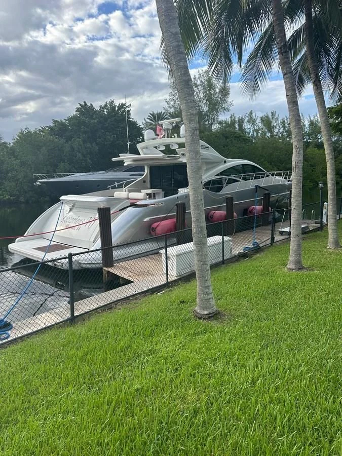 a boat parked on the grass aboard KNOTORIOUS IV Yacht for Sale