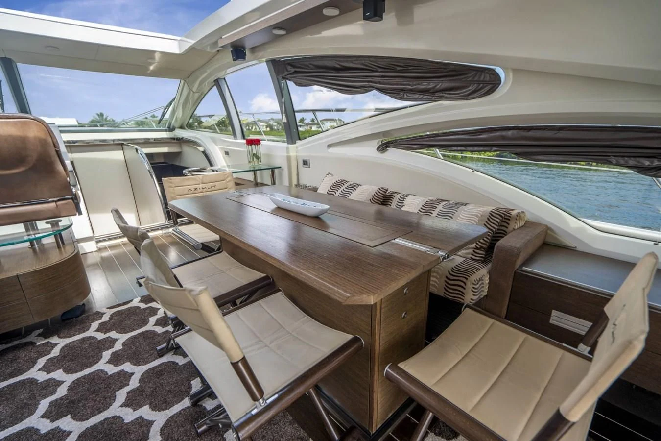 a table on a boat aboard KNOTORIOUS IV Yacht for Sale