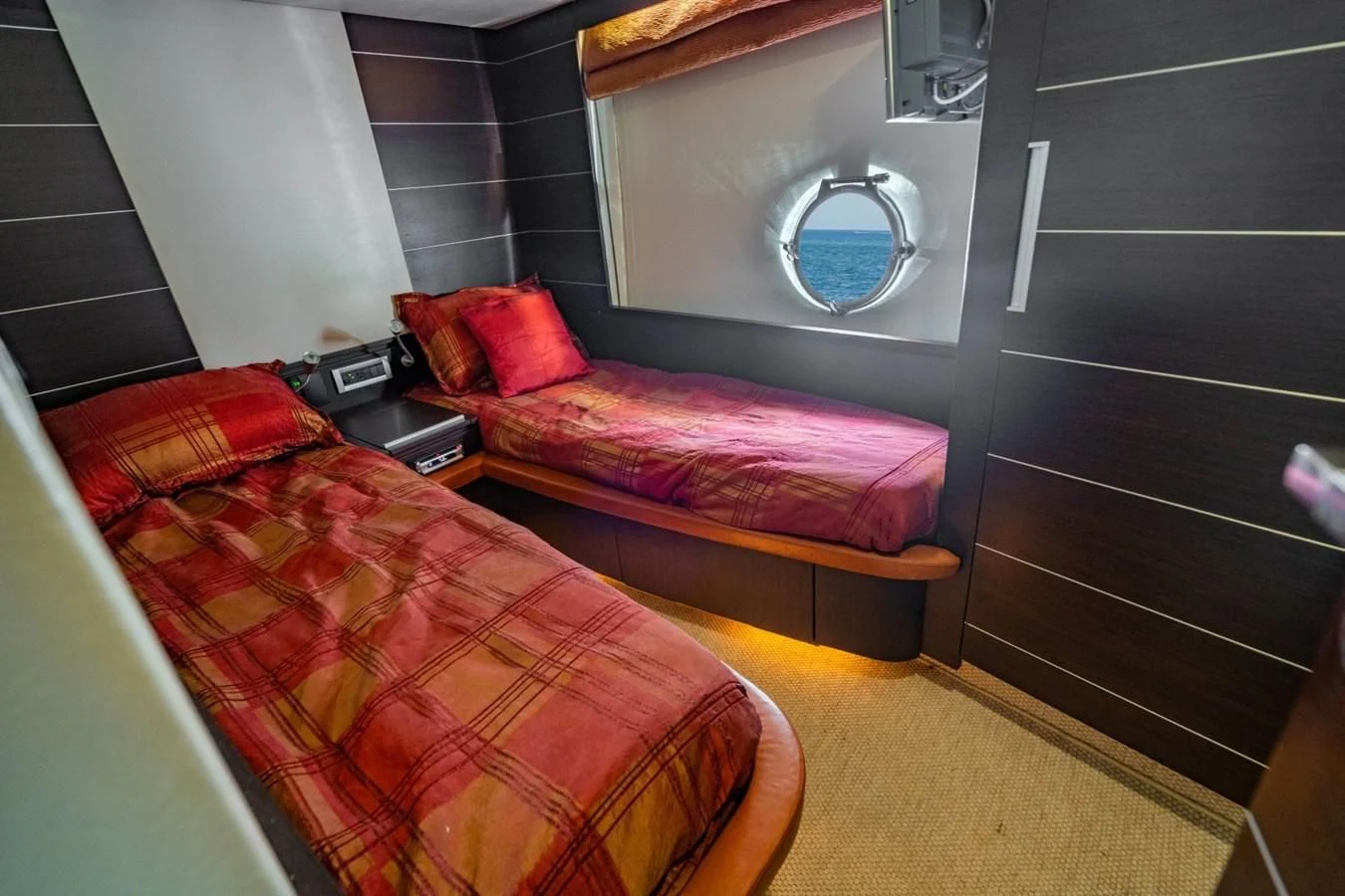 a couple of beds in a room aboard KNOTORIOUS IV Yacht for Sale