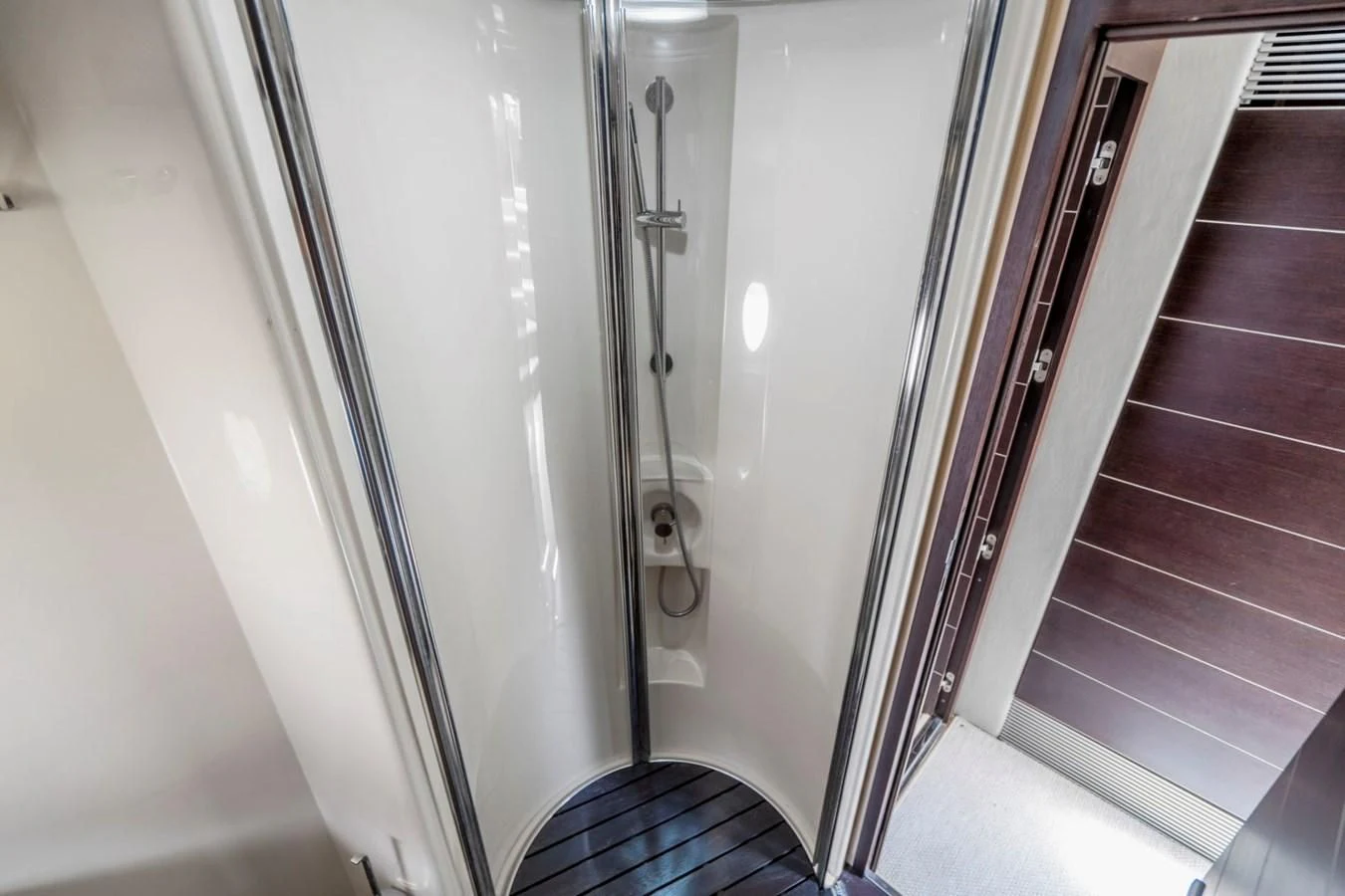 a silver door with a handle aboard KNOTORIOUS IV Yacht for Sale