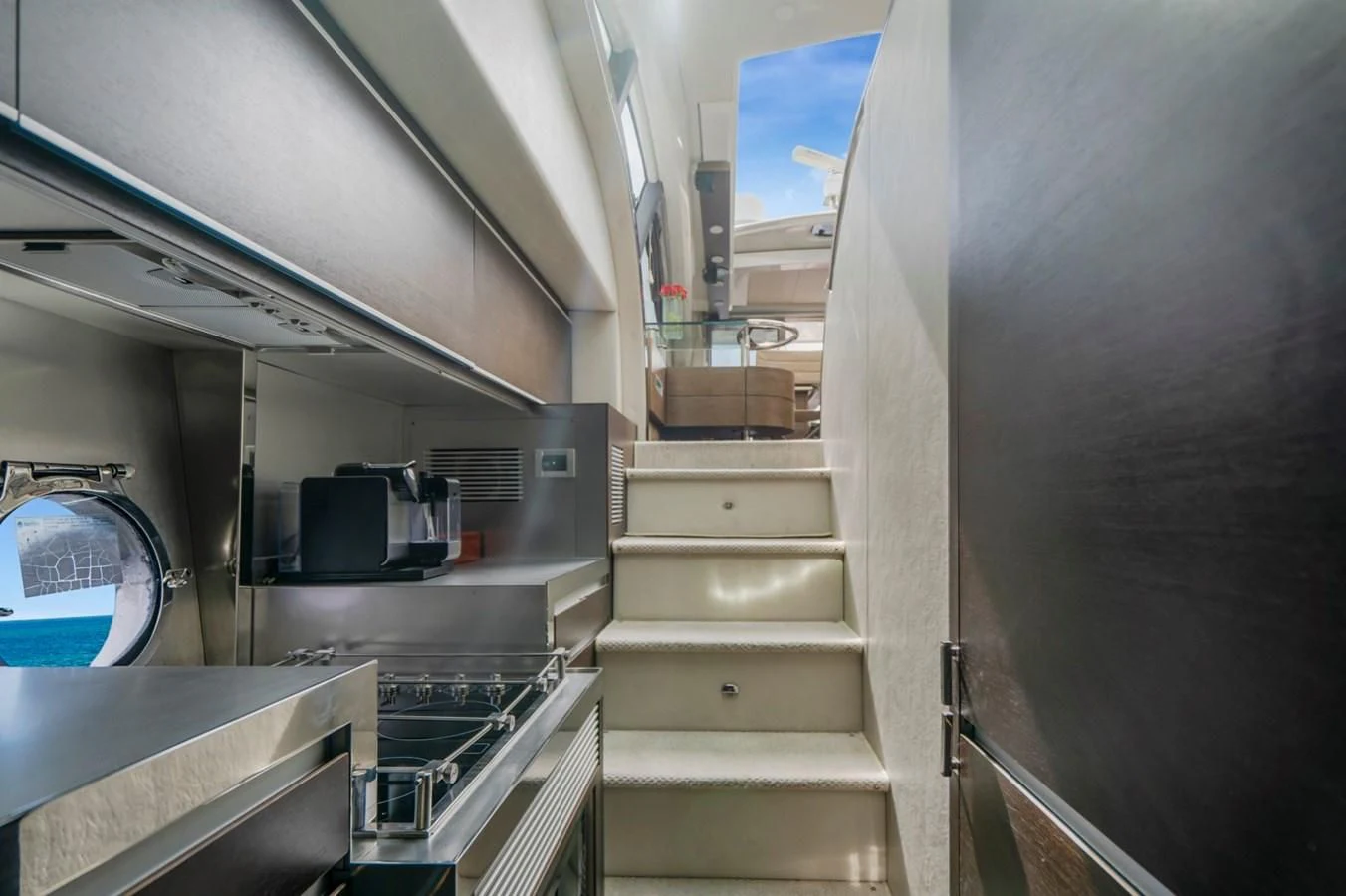 a staircase leading to a room aboard KNOTORIOUS IV Yacht for Sale