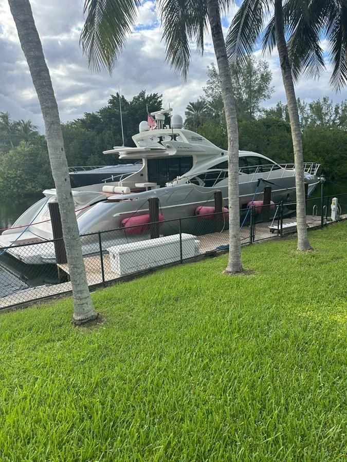 a boat parked on the grass aboard KNOTORIOUS IV Yacht for Sale