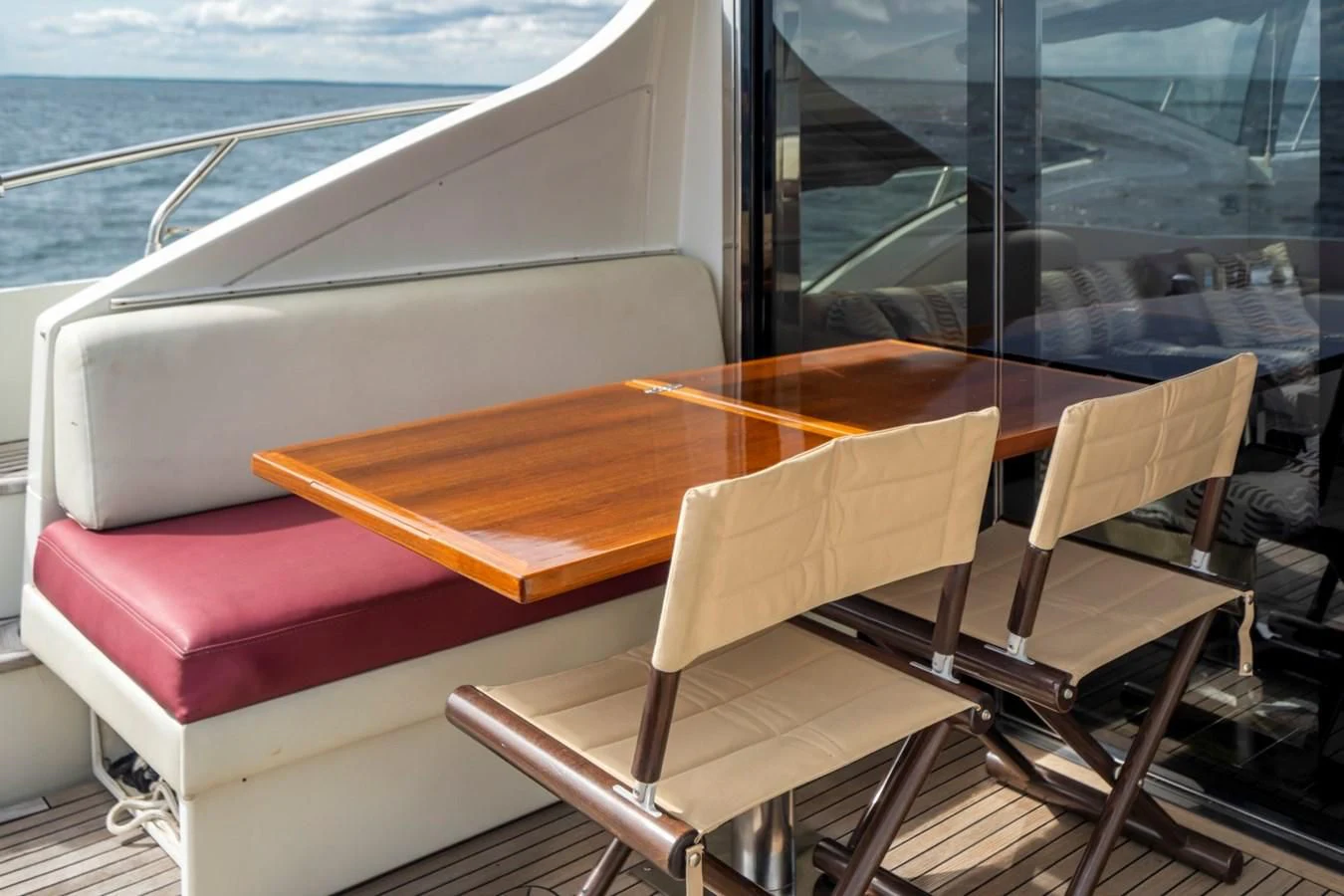 a table and chairs on a boat aboard KNOTORIOUS IV Yacht for Sale