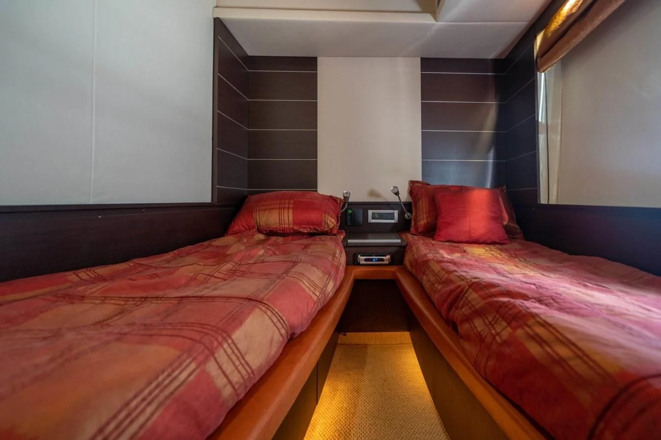 a room with two beds aboard KNOTORIOUS IV Yacht for Sale