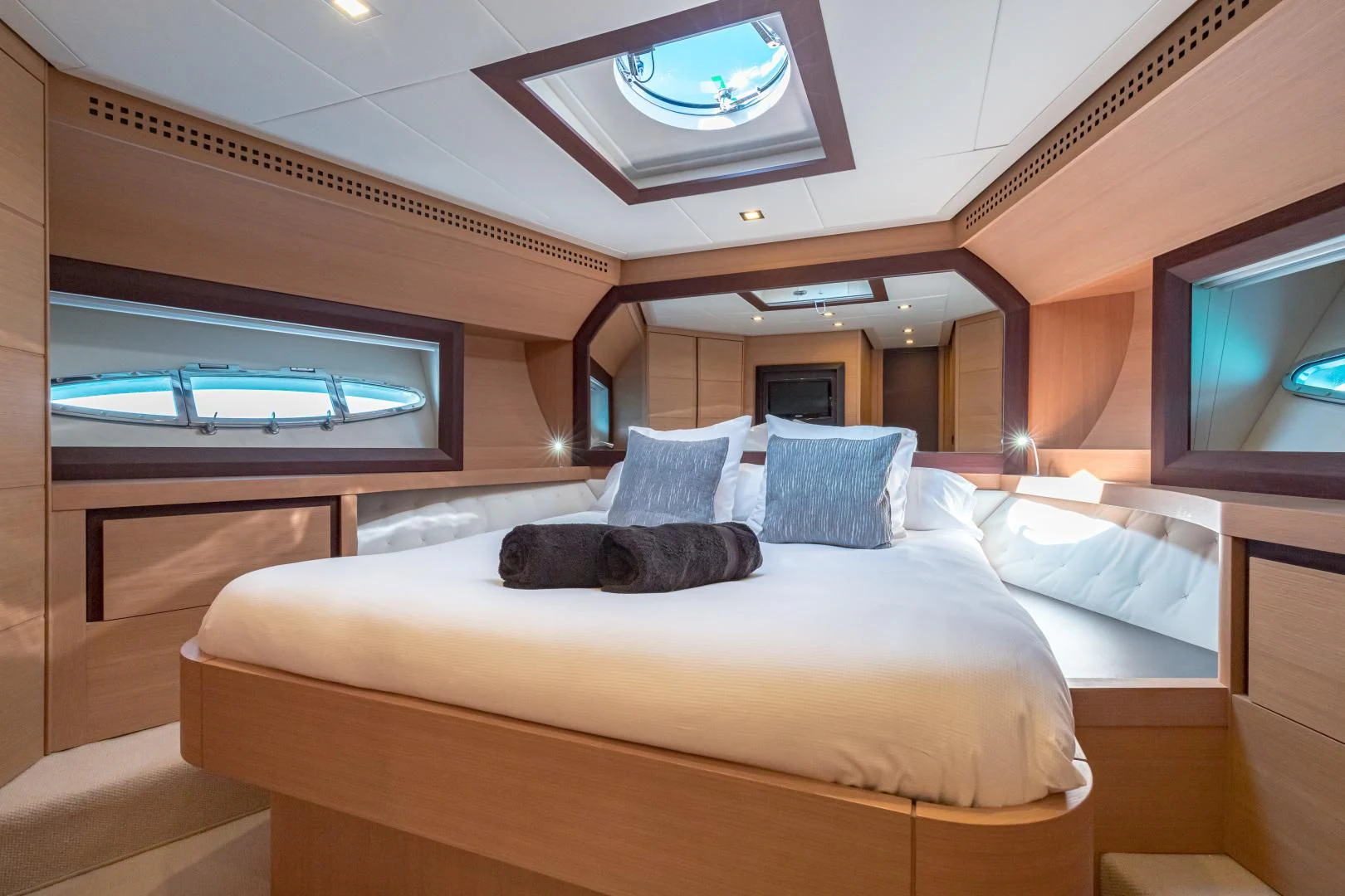 a large bed in a room aboard LOONEY Yacht for Sale