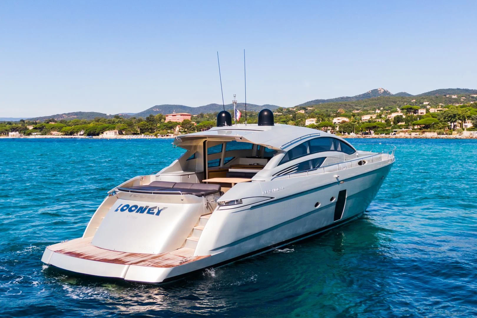 a white boat in the water aboard LOONEY Yacht for Sale