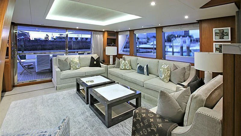 a living room with a large window aboard BELLE VIE Yacht for Sale