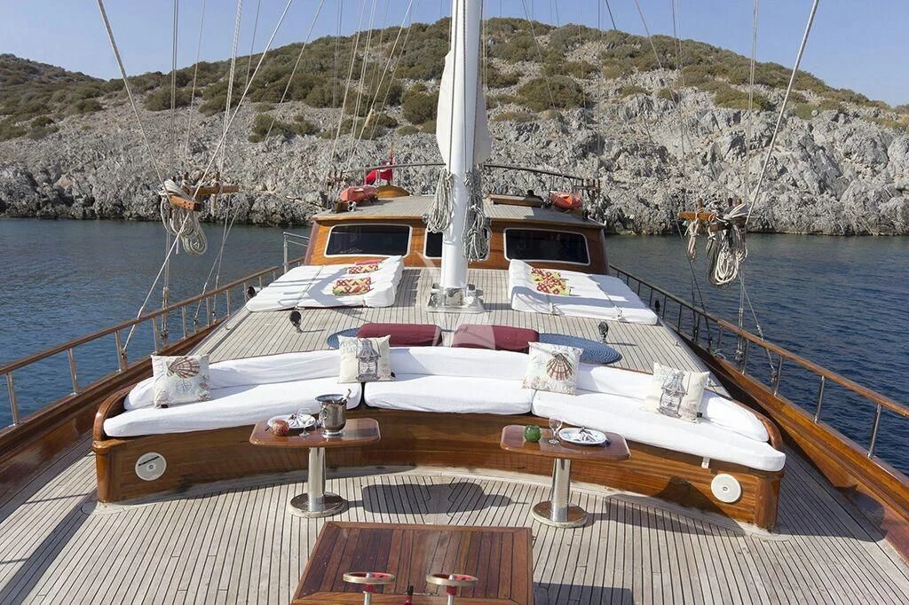 a boat on a deck aboard DREAMLAND Yacht for Sale