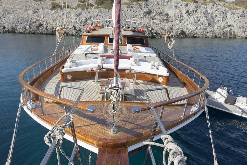 a boat tied to a dock aboard DREAMLAND Yacht for Sale