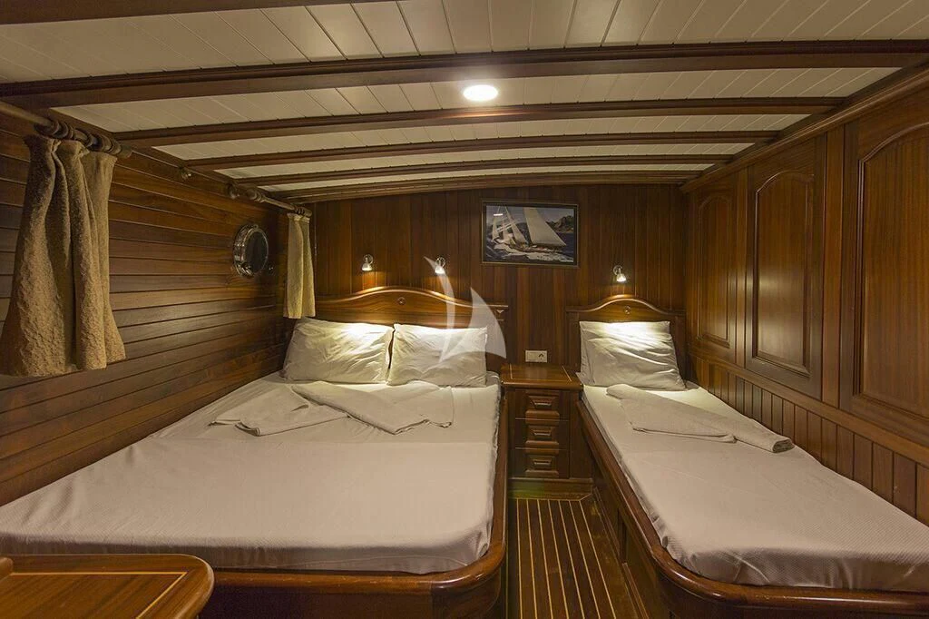 a room with two beds aboard DREAMLAND Yacht for Sale