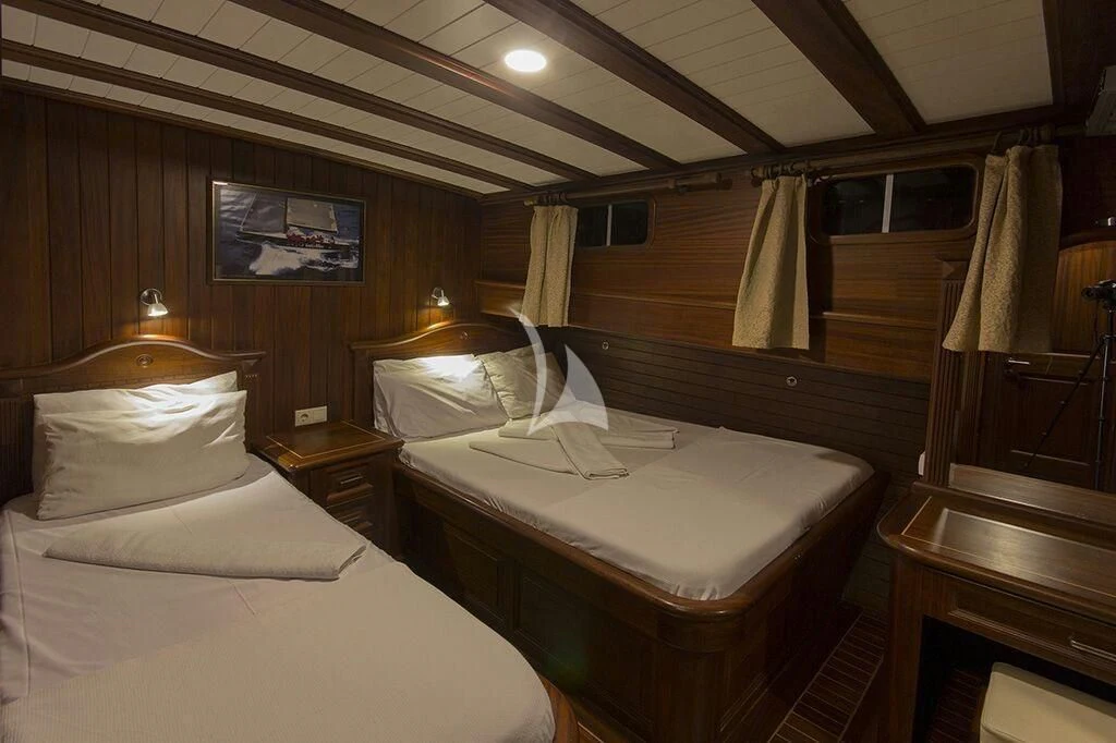 a room with two beds aboard DREAMLAND Yacht for Sale
