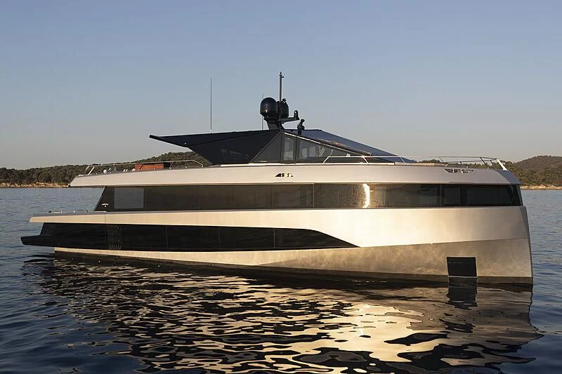 a boat on the water aboard TELL ME WHY Yacht for Sale