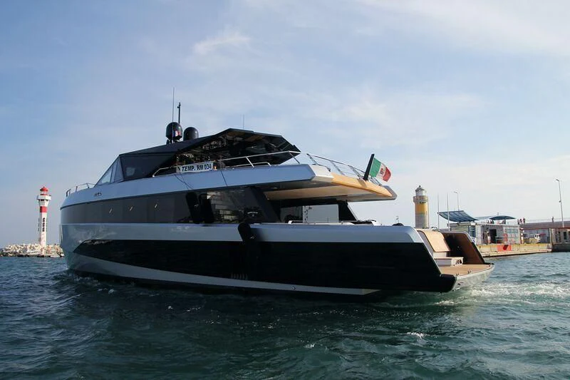 a boat in the water aboard TELL ME WHY Yacht for Sale