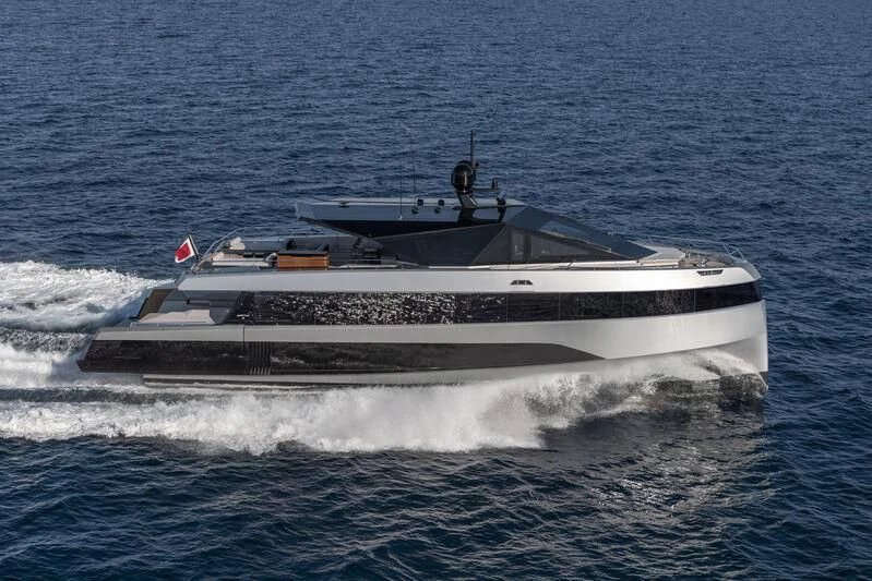 a boat on the water aboard TELL ME WHY Yacht for Sale