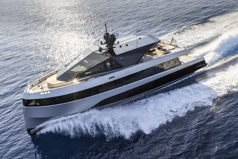 a boat on the water aboard TELL ME WHY Yacht for Sale