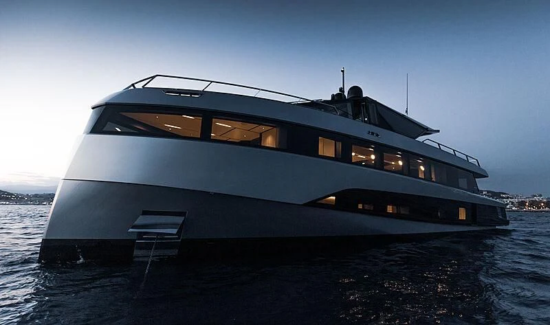 a large yacht on the water aboard TELL ME WHY Yacht for Sale