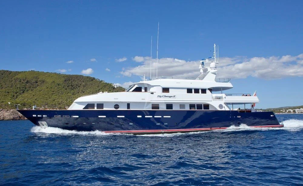 a large boat on the water aboard BIG CHANGE II Yacht for Sale