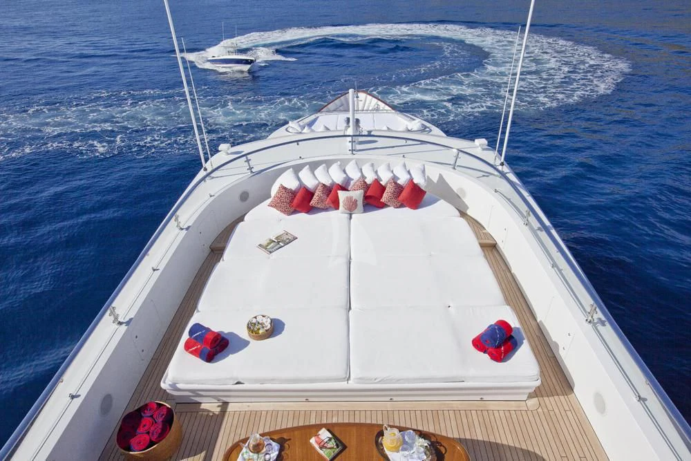 a white boat on the water aboard BIG CHANGE II Yacht for Sale