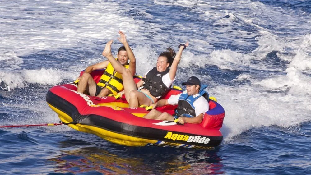 a group of people on a raft in the water aboard BIG CHANGE II Yacht for Sale