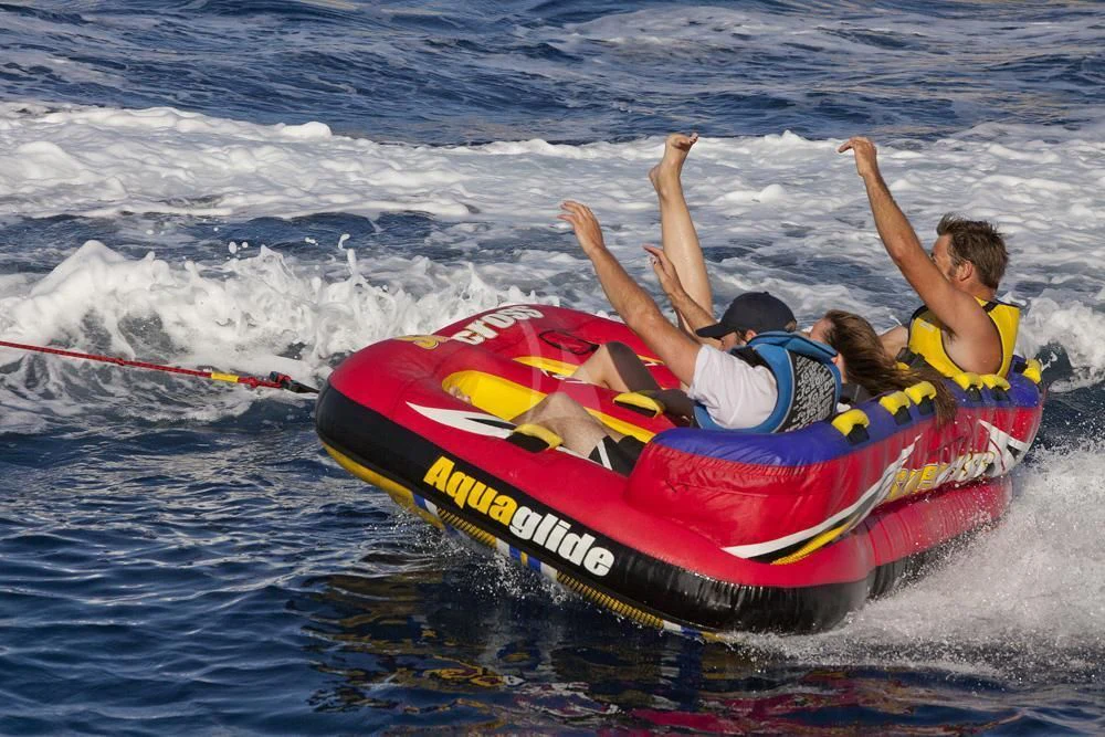 a group of people riding a speed boat in the water aboard BIG CHANGE II Yacht for Sale