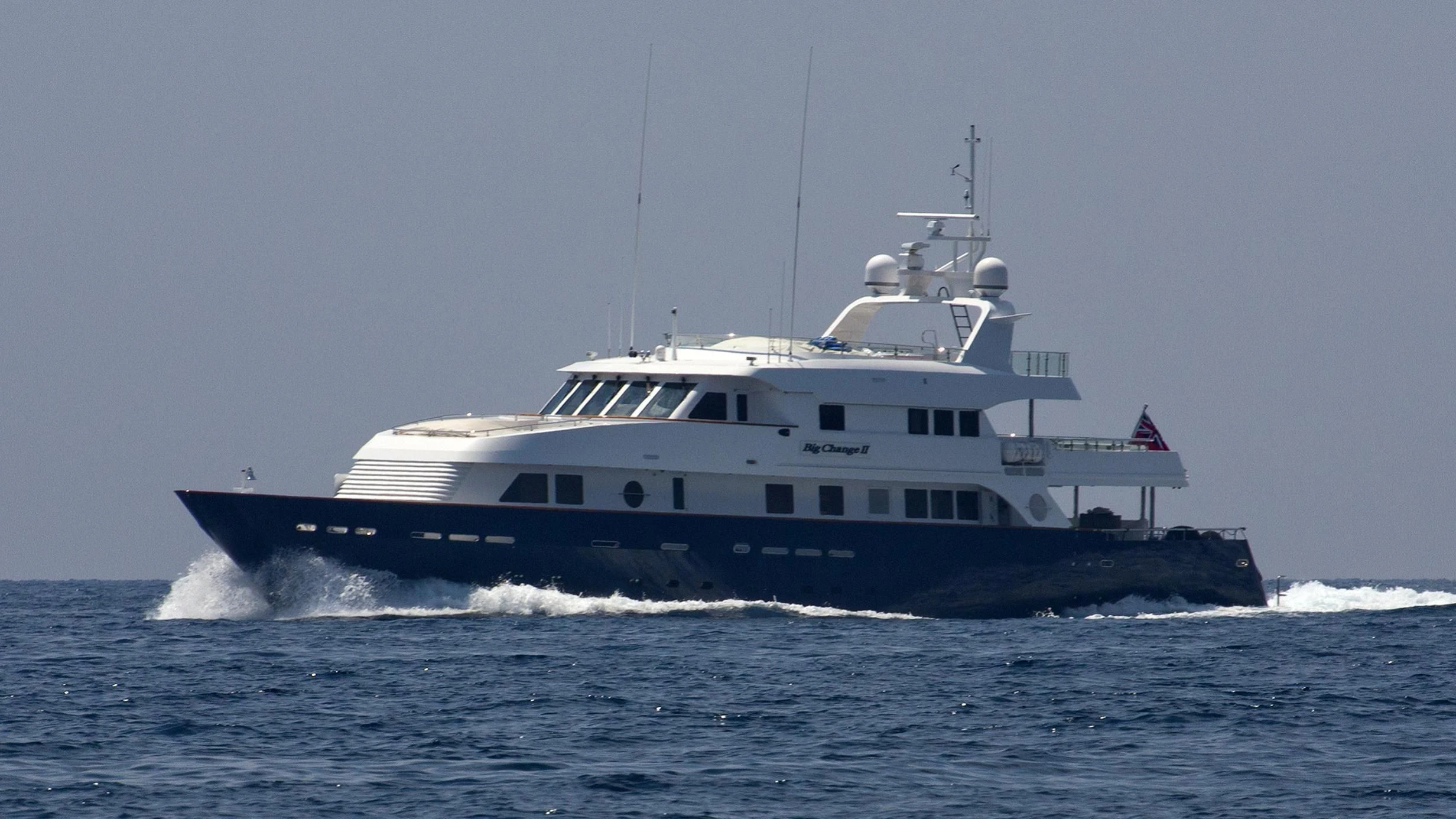 a large boat on the water aboard BIG CHANGE II Yacht for Sale