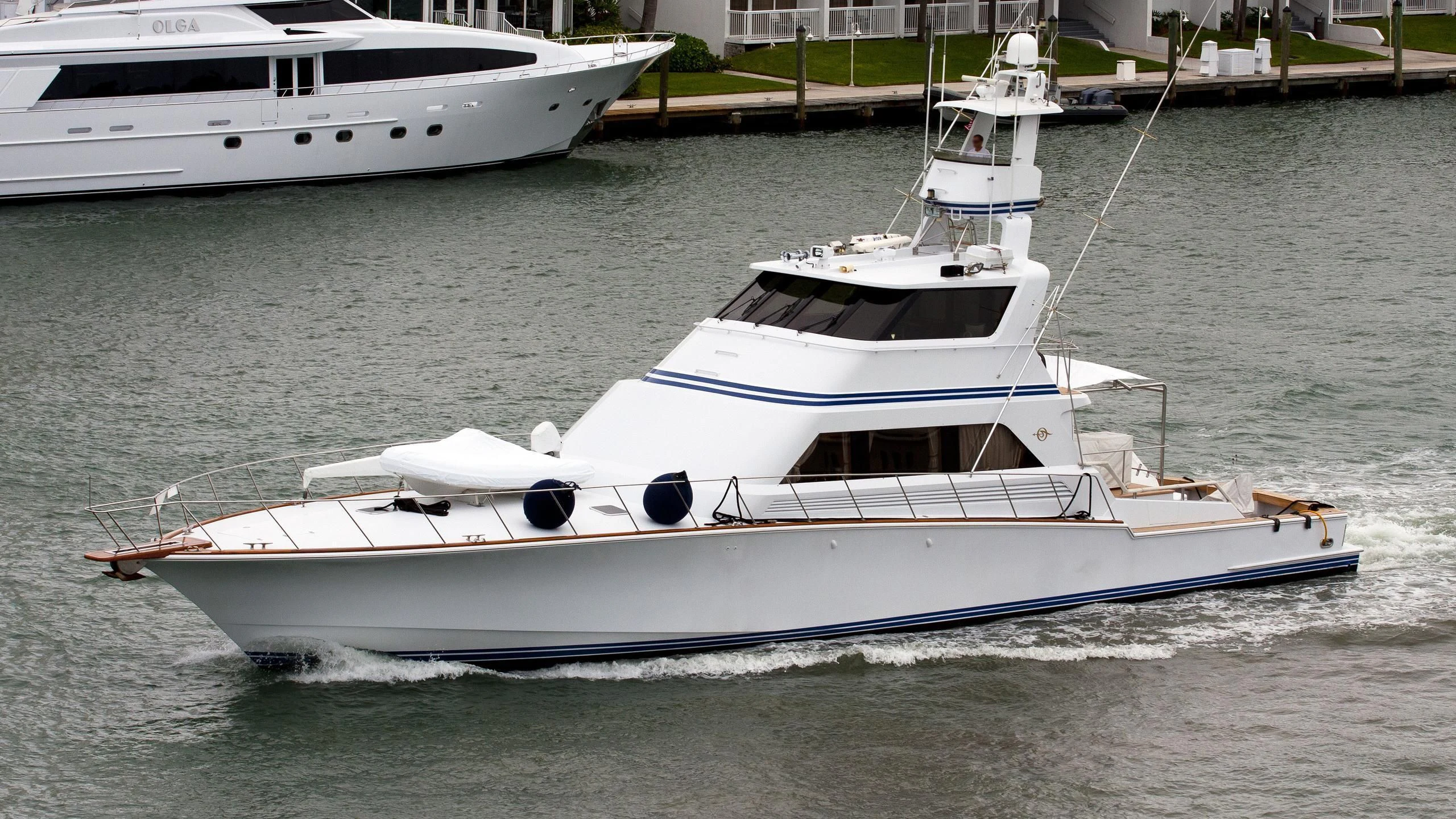 a white boat in the water aboard GOLDEN OSPREY Yacht for Sale
