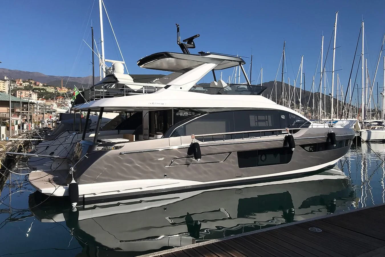 a boat with a helicopter on top aboard SUNSTROKE Yacht for Sale