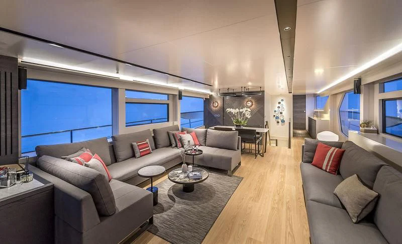 a living room with a large window aboard GIOIA Yacht for Sale