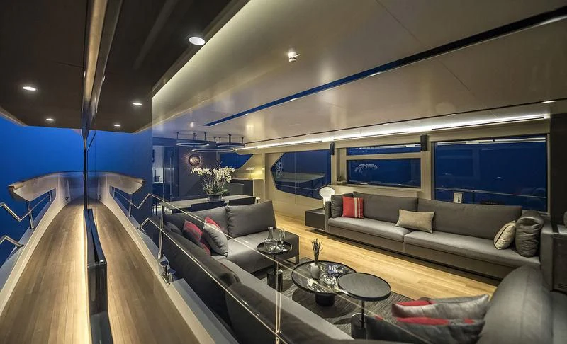 a living room with a large window aboard GIOIA Yacht for Sale