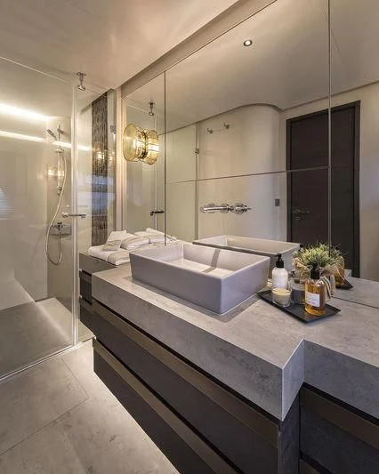 a bathroom with a large bathtub aboard GIOIA Yacht for Sale