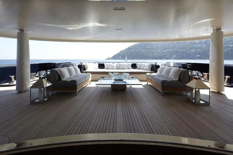 a large living room with a large body of water aboard HIGH POWER III Yacht for Sale