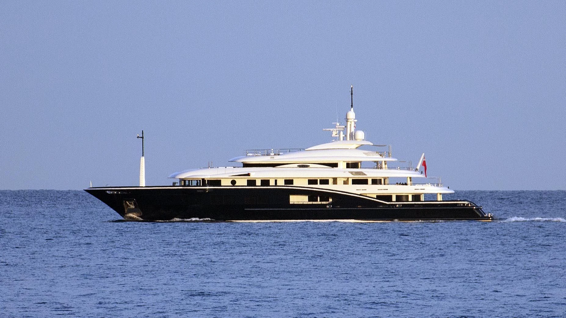 a large boat on the water aboard HIGH POWER III Yacht for Sale