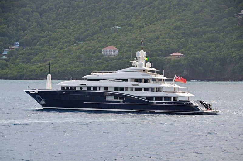 a large boat on the water aboard HIGH POWER III Yacht for Sale