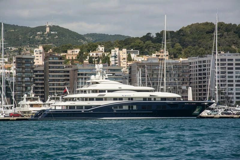 a large ship in the water aboard HIGH POWER III Yacht for Sale