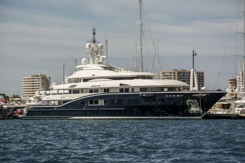 a large white boat in the water aboard HIGH POWER III Yacht for Sale