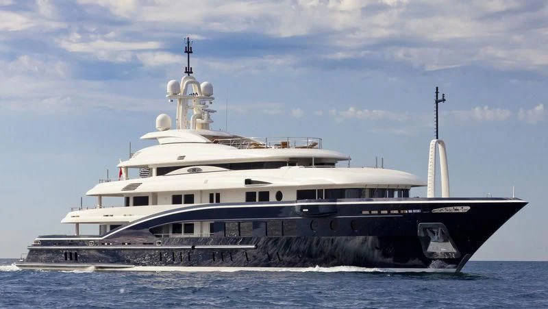 a large ship in the water aboard HIGH POWER III Yacht for Sale