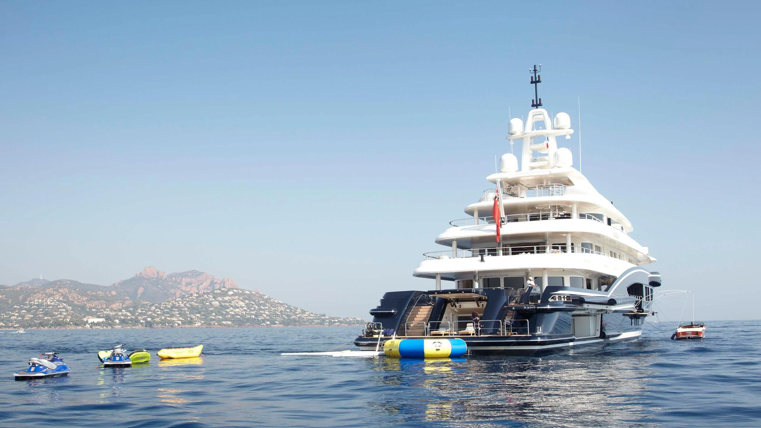 a large white boat in the water aboard HIGH POWER III Yacht for Sale
