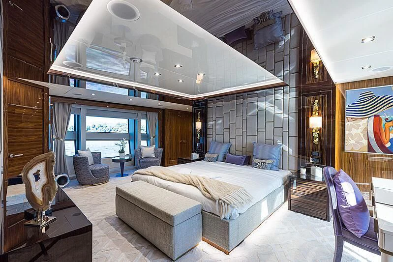 a large bedroom with a large bed aboard THE BOAT OF FATE 2 Yacht for Sale
