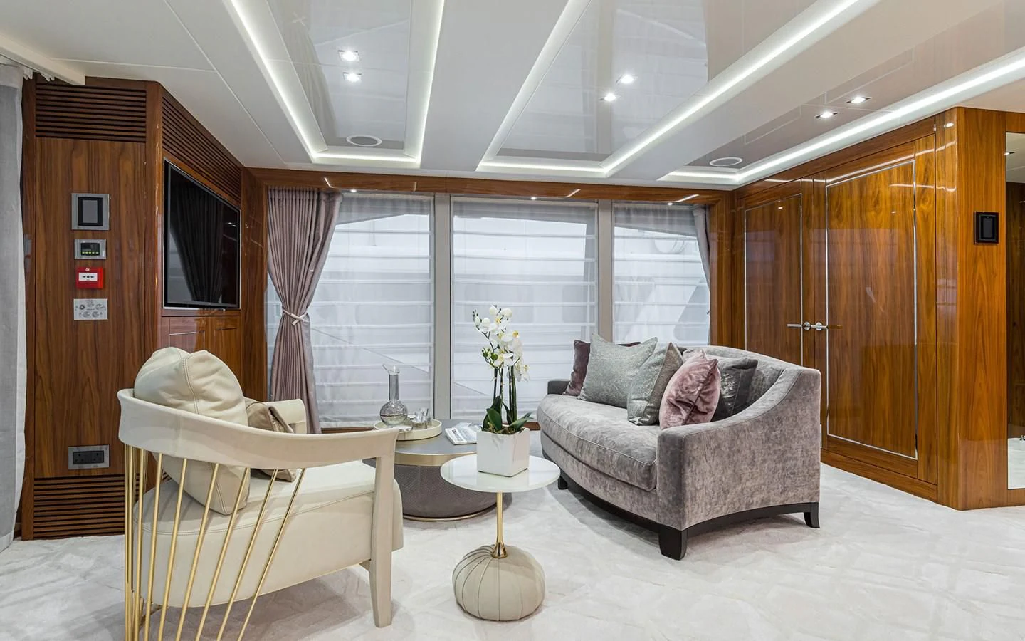 a living room with a couch and a table aboard THE BOAT OF FATE 2 Yacht for Sale