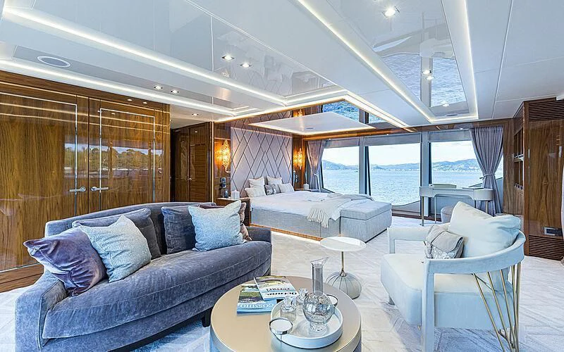 a living room with a large window aboard THE BOAT OF FATE 2 Yacht for Sale
