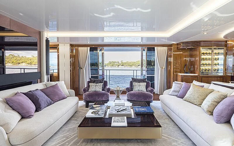 a living room with a large window aboard THE BOAT OF FATE 2 Yacht for Sale