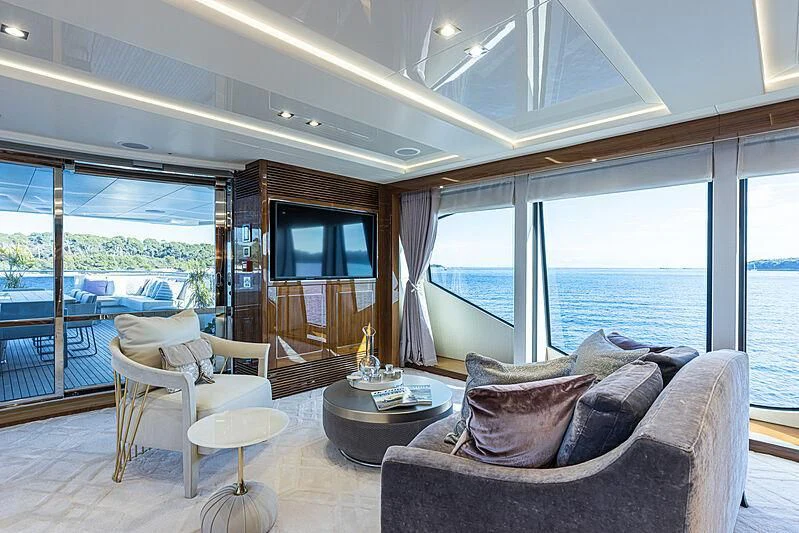 a living room with a large window aboard THE BOAT OF FATE 2 Yacht for Sale