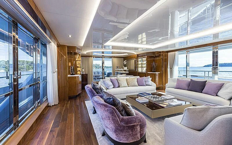a living room with a wood floor aboard THE BOAT OF FATE 2 Yacht for Sale