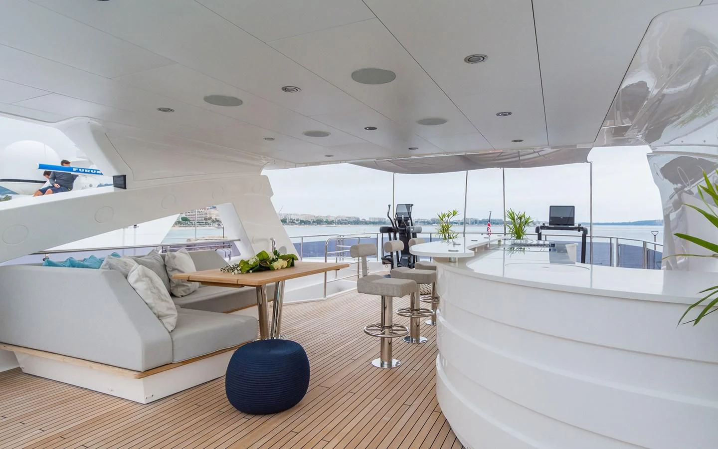 a modern bedroom with a large window aboard THE BOAT OF FATE 2 Yacht for Sale