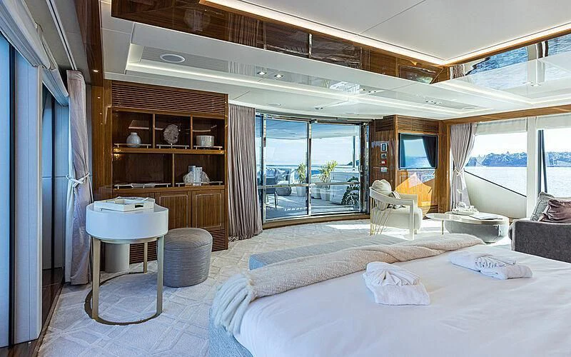 a bedroom with a large bed aboard THE BOAT OF FATE 2 Yacht for Sale