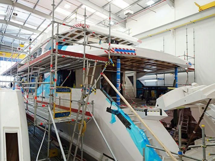 a large room with several ladders aboard THE BOAT OF FATE 2 Yacht for Sale