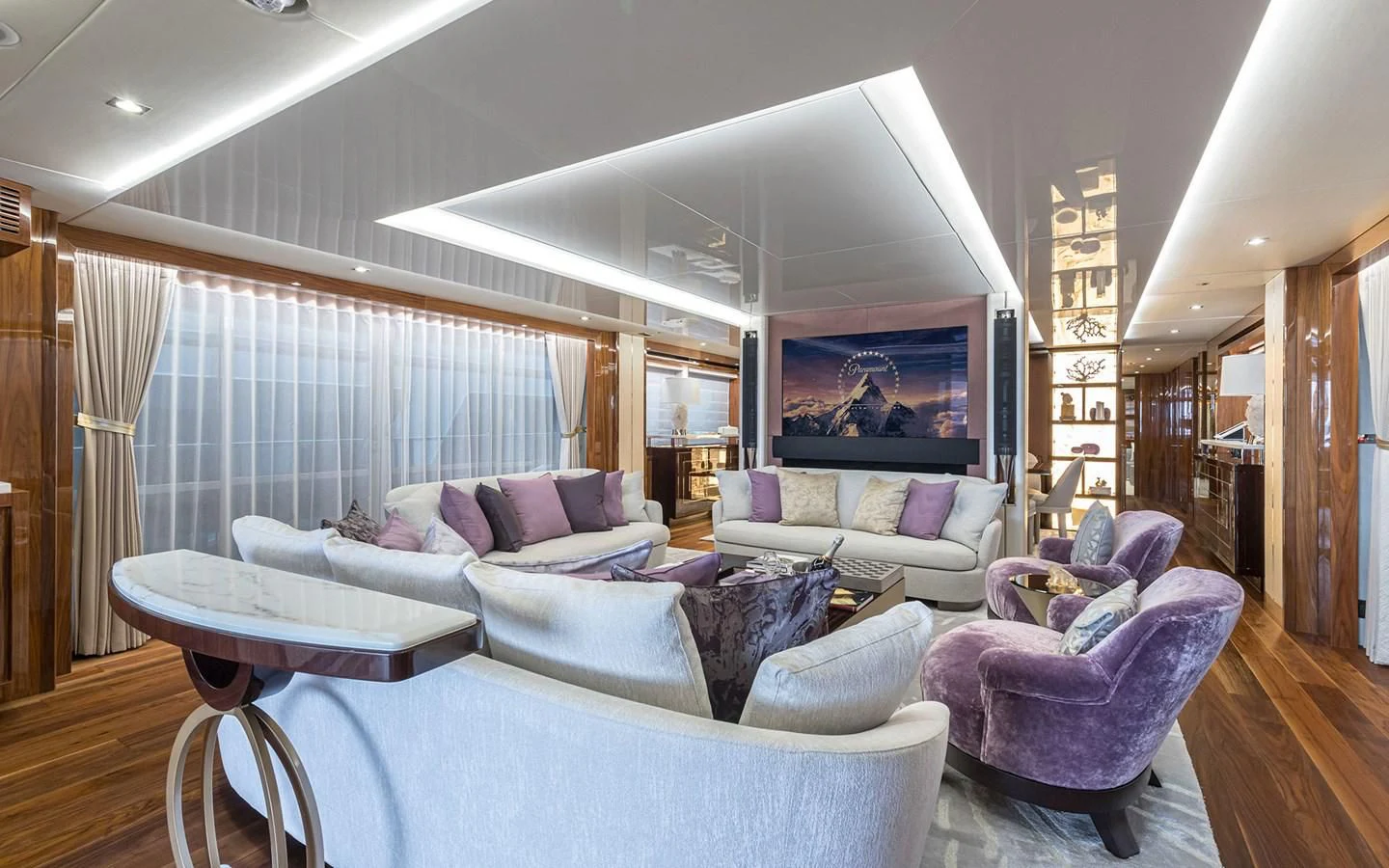 a living room with a large window aboard THE BOAT OF FATE 2 Yacht for Sale