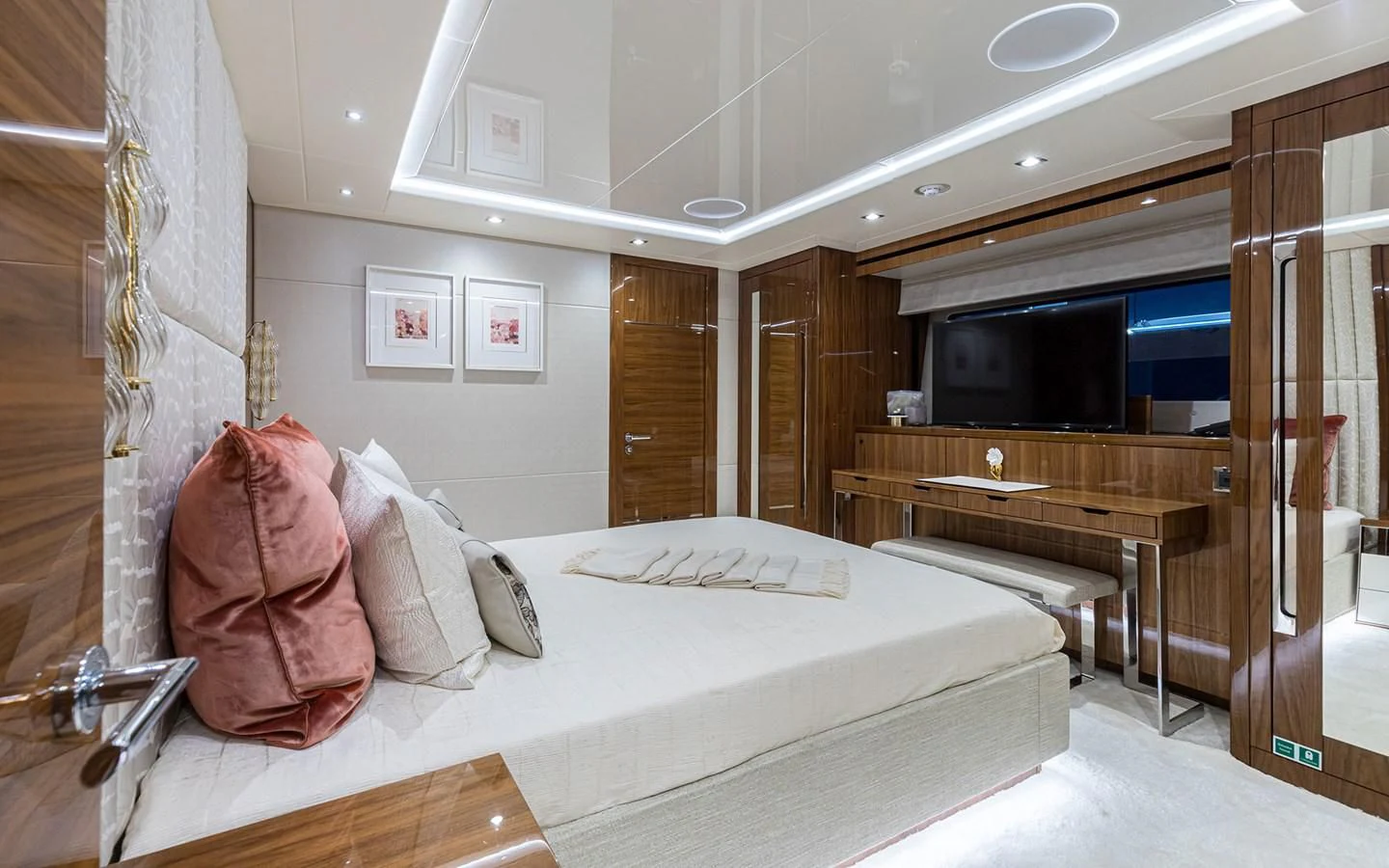 a room with a bed and desk aboard THE BOAT OF FATE 2 Yacht for Sale