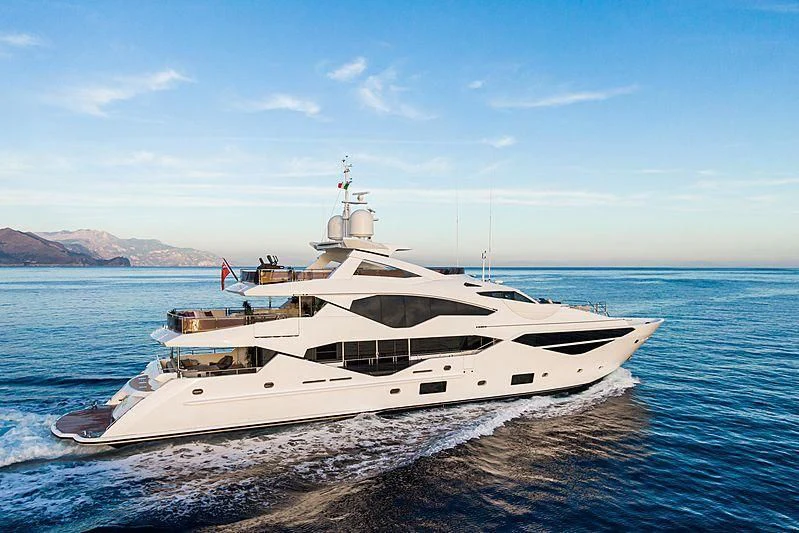 a white yacht on the water aboard THE BOAT OF FATE 2 Yacht for Sale